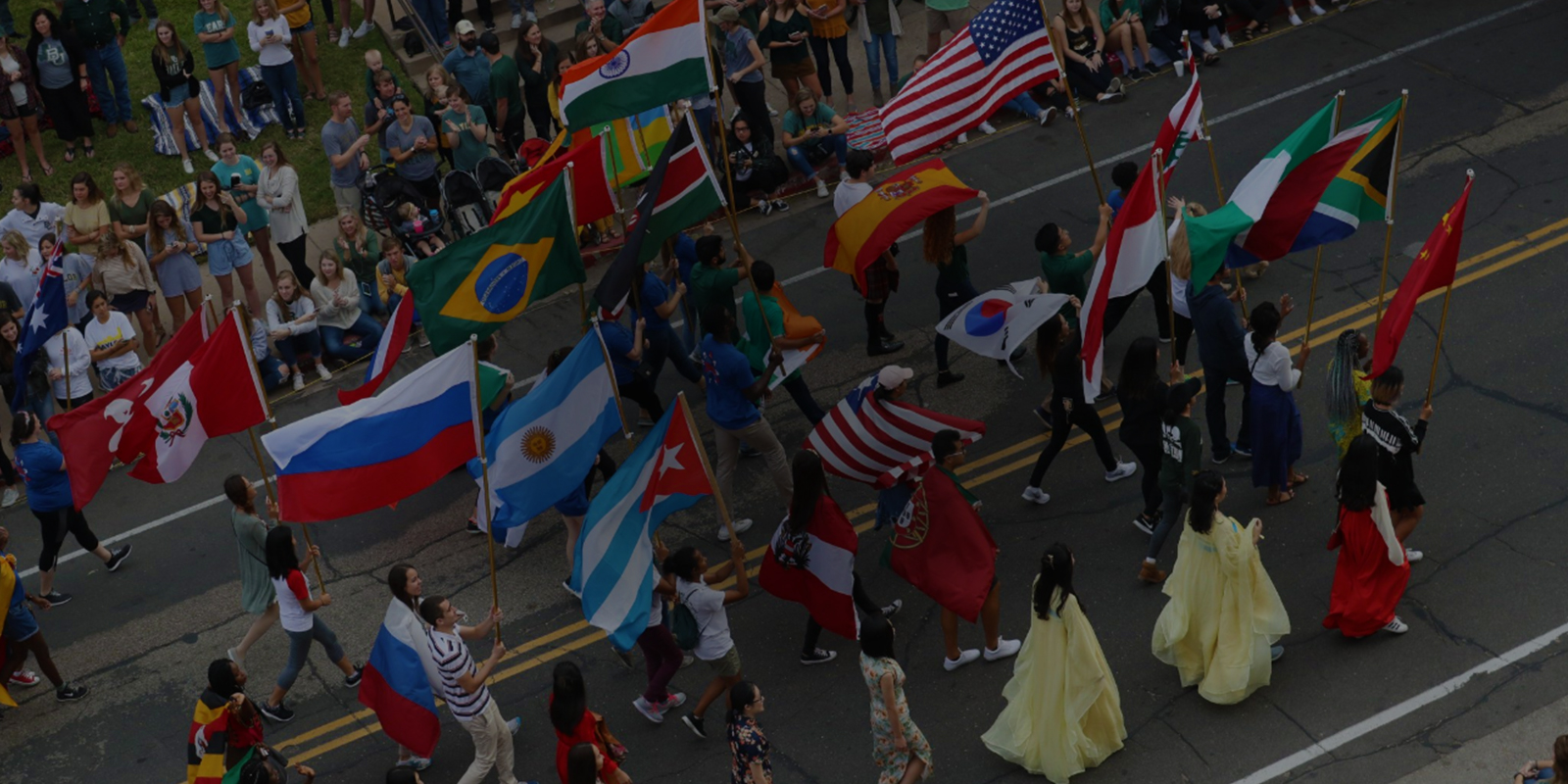 students walking with flags