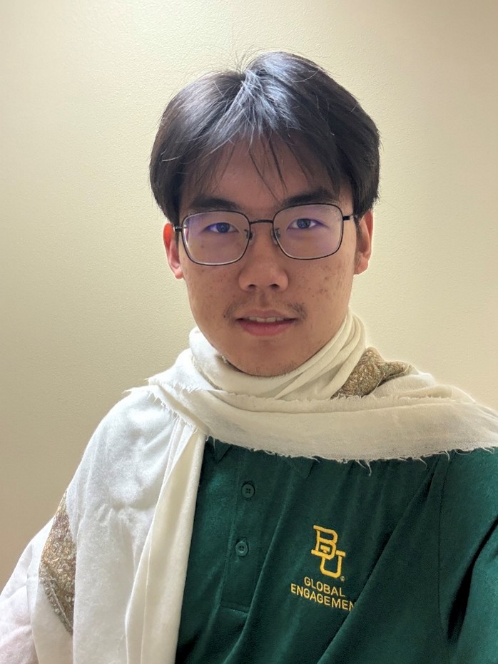 Headshot of male student from China.