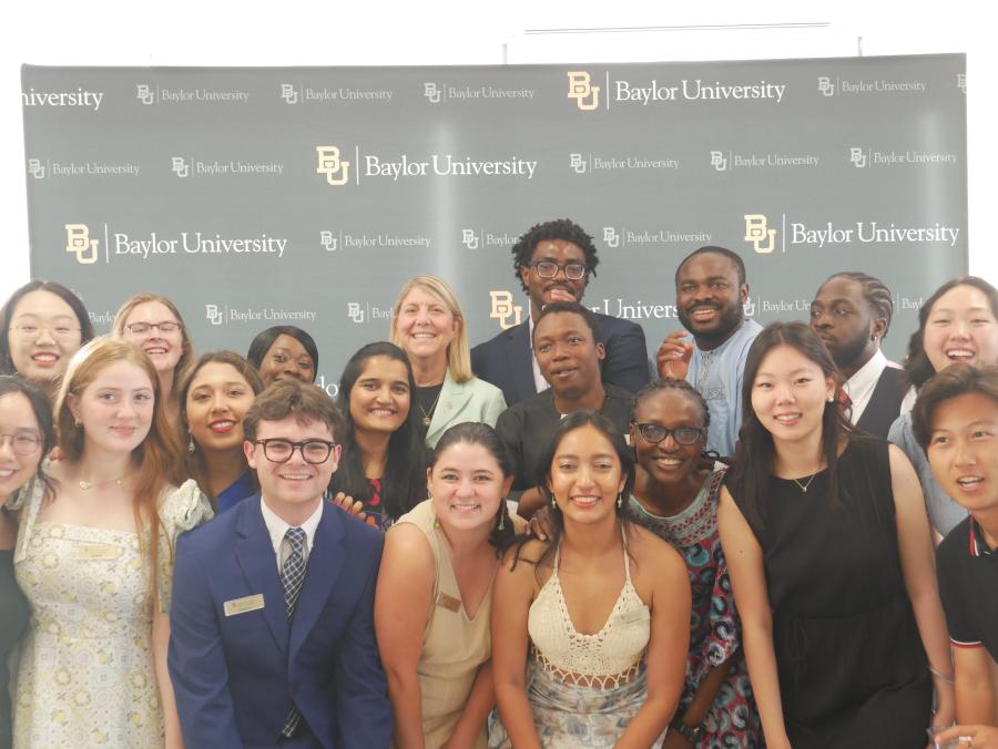 Group of students with Baylor president Linda Livingstone