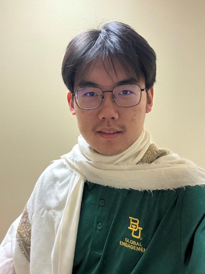 Headshot of male student from China.